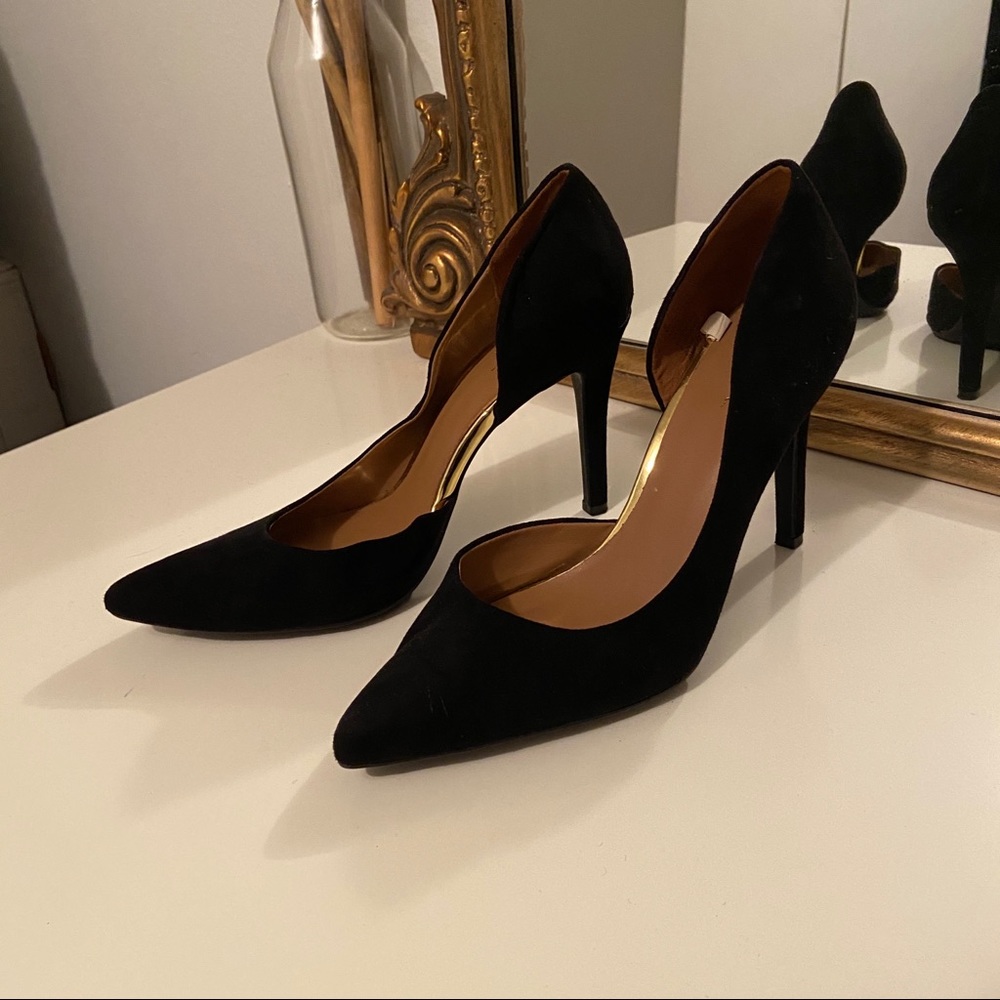 Black suede pumps